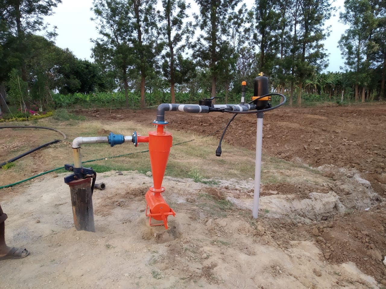 Filtration and control head installed at a borewell beside a banana plantation